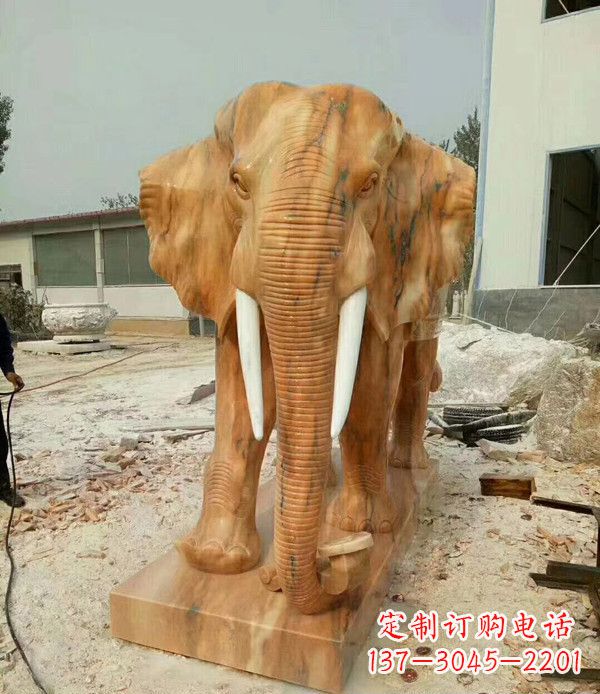 济南鼻卷如意晚霞红招财大象石雕