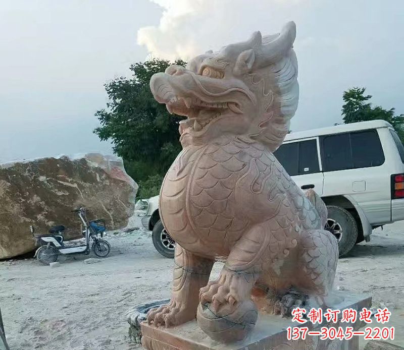 济南踩球麒麟晚霞红石雕