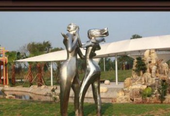 济南一对动感传情的不锈钢跳舞情侣雕塑