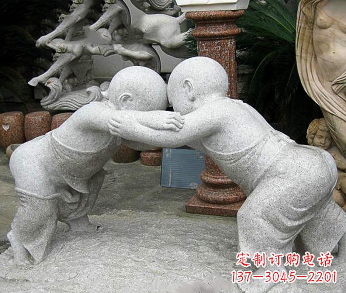 济南可爱小孩摔跤石雕