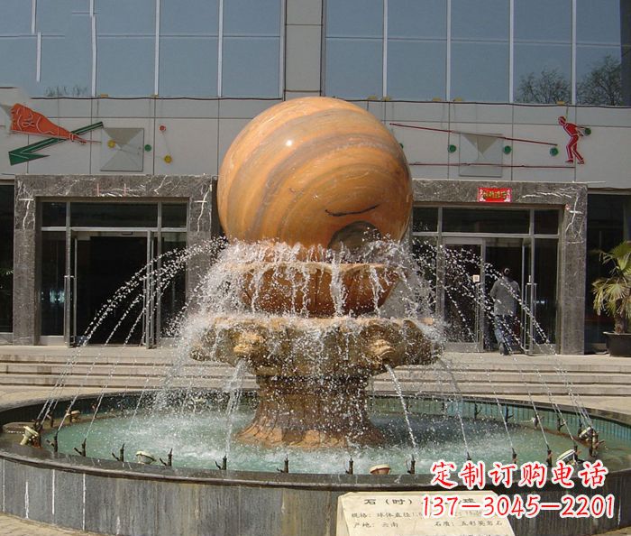济南石来运转球晚霞红风水球石雕