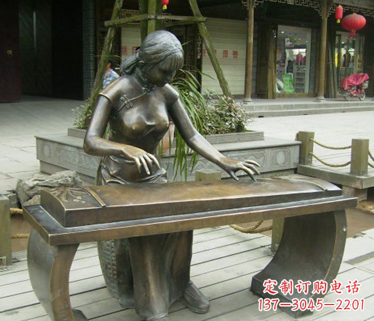 济南铜雕现代人物弹古筝雕塑