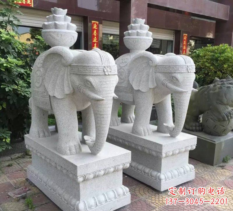 济南驮元宝的大象石雕