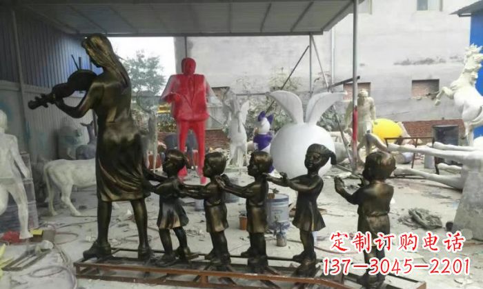 济南校园老师和儿童铜雕