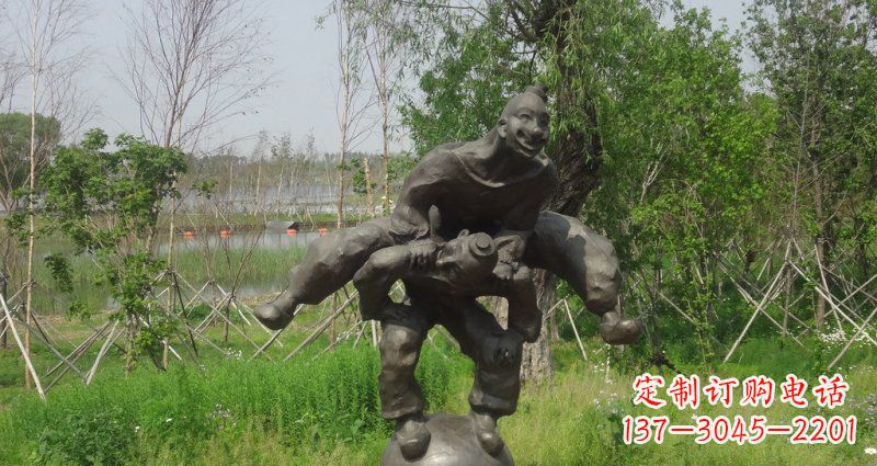 济南园林站在球上面跳山羊的人物景观铜雕